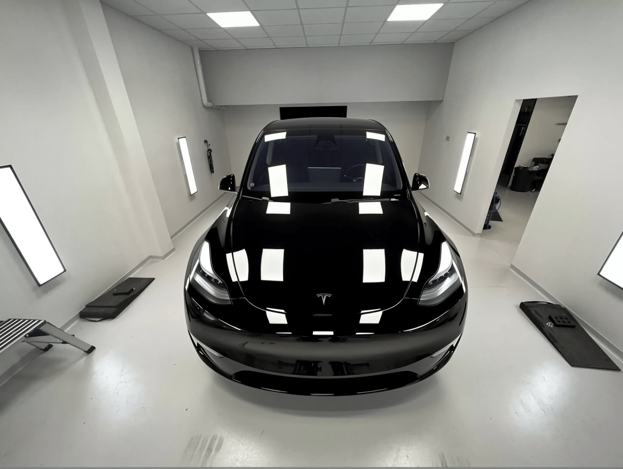 antoinegoons_A_2024_Tesla_Model_Y_in_deep_gloss_black_seamles_76b5c646-44e7-4617-9086-868bb6c05755_1